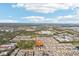 Expansive aerial view of a suburban community with a variety of homes and proximity to urban amenities at 5808 Calla Lilly Dr, Sarasota, FL 34232