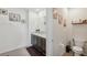 Modern bathroom with double vanity and toilet at 5808 Calla Lilly Dr, Sarasota, FL 34232