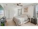 Well-lit bedroom with king-size bed and plenty of sunlight at 5808 Calla Lilly Dr, Sarasota, FL 34232