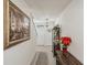 Bright entryway with decorative accents and a large framed print at 5808 Calla Lilly Dr, Sarasota, FL 34232