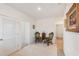 Upstairs hallway with two green velvet chairs and decorative wall at 5808 Calla Lilly Dr, Sarasota, FL 34232