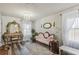 Elegant sitting room with ornate furniture and chandelier at 5808 Calla Lilly Dr, Sarasota, FL 34232
