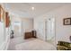 Spacious upstairs hallway with two additional bedrooms and linen closet at 5808 Calla Lilly Dr, Sarasota, FL 34232