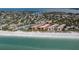Aerial showing beachfront community and surrounding neighborhood at 6006 Gulf Dr # 207, Holmes Beach, FL 34217