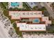Direct overhead view of condo complex with pool and beach access at 6006 Gulf Dr # 207, Holmes Beach, FL 34217