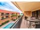 Private balcony overlooking the pool and ocean at 6006 Gulf Dr # 207, Holmes Beach, FL 34217