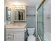Updated bathroom with a shower/tub combo and vanity at 6006 Gulf Dr # 207, Holmes Beach, FL 34217