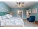 King bed, coastal decor, and access to a bathroom and hallway at 6006 Gulf Dr # 207, Holmes Beach, FL 34217