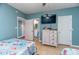 Two twin beds, dresser, and access to bathroom at 6006 Gulf Dr # 207, Holmes Beach, FL 34217