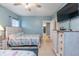 Guest bedroom with two twin beds and a TV at 6006 Gulf Dr # 207, Holmes Beach, FL 34217
