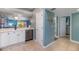 Modern kitchen with stainless steel appliances and white cabinets at 6006 Gulf Dr # 207, Holmes Beach, FL 34217