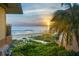 Stunning sunrise view over the ocean from private balcony at 6006 Gulf Dr # 207, Holmes Beach, FL 34217