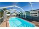 Inviting screened pool area with brick pavers and safety fence at 11134 115Th St, Largo, FL 33778