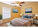 Guest bedroom with neutral decor and ceiling fan at 11412 Coconut Island Dr, Riverview, FL 33569