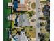 Aerial view of waterfront homes with boat docks, swimming pools, and manicured landscaping at 123 8Th E St, Tierra Verde, FL 33715