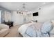 Comfortable bedroom with carpet flooring, TV, and closet at 123 8Th E St, Tierra Verde, FL 33715