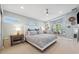 Spacious bedroom with bay window seating, ceiling fan, and modern decor at 123 8Th E St, Tierra Verde, FL 33715