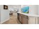 Hallway with bar, cabinets, countertop, and open floor plan at 123 8Th E St, Tierra Verde, FL 33715