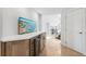 Hallway with bar, cabinets, countertop, and open floor plan at 123 8Th E St, Tierra Verde, FL 33715