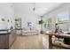 Home office with a comfortable couch and a wooden desk and filing cabinet at 123 8Th E St, Tierra Verde, FL 33715