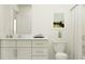 Modern bathroom with white cabinets, quartz countertop, and shower/tub combo at 12442 Sweet Angel Aura Way, Parrish, FL 34219