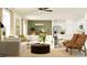 Spacious living room featuring L-shaped sectional sofa at 12442 Sweet Angel Aura Way, Parrish, FL 34219