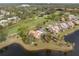 Aerial view of community with golf course and water features at 1328 Pelican Creek Xing # D, St Petersburg, FL 33707