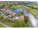 Aerial view of community near golf course and lake at 1328 Pelican Creek Xing # D, St Petersburg, FL 33707