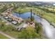Aerial view of condo community, showcasing property location and golf course views at 1328 Pelican Creek Xing # D, St Petersburg, FL 33707