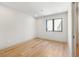 Bright bedroom with hardwood floors and large windows offering plenty of natural light at 1412 S Moody Ave # A, Tampa, FL 33629