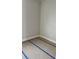 Empty bedroom with wood flooring and painted walls at 1412 S Moody Ave # A, Tampa, FL 33629