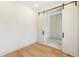 Bright office space features modern sliding doors and hardwood flooring, creating a stylish work environment at 1412 S Moody Ave # A, Tampa, FL 33629