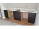 Modern wet bar with white quartz countertop at 1412 S Moody Ave # A, Tampa, FL 33629