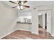 Dining area with kitchen passthrough and view into hallway at 1799 N Highland Ave # 28, Clearwater, FL 33755