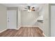 Dining area with wood-look floors and ceiling fan at 1799 N Highland Ave # 28, Clearwater, FL 33755