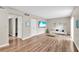 Welcoming living room with ample space, wood-style floors, and stylish furniture at 1799 N Highland Ave # 28, Clearwater, FL 33755