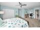 Spacious bedroom with a built-in workspace and large closet at 2404 Forecastle Dr, Palm Harbor, FL 34685