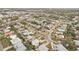 Aerial view of residential neighborhood showcasing houses and streets at 2456 Tradewinds Dr, Dunedin, FL 34698