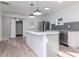 Modern kitchen with white cabinets and quartz countertops at 2704 E 24Th Ave, Tampa, FL 33605