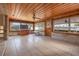 Sunroom with wood ceiling and tiled floor, ready for renovation at 289 Rafael Ne Blvd, St Petersburg, FL 33704