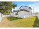 Exterior view of the home from the backyard, showing its modern design at 3006 E Columbus Dr, Tampa, FL 33605