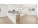 Spacious open-concept kitchen and dining area with modern finishes at 3006 E Columbus Dr, Tampa, FL 33605