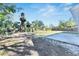 Backyard patio and a wooden fence at 527 Fox Run Trl, Apollo Beach, FL 33572