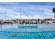 Large community pool with covered seating area and marina views at 6307 Pasadena Point Blvd, Gulfport, FL 33707