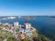 Aerial view of waterfront condo building with pool and parking at 6372 Palma Del Mar S Blvd # 505, St Petersburg, FL 33715