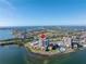 Aerial view of waterfront condo building with pool and parking at 6372 Palma Del Mar S Blvd # 505, St Petersburg, FL 33715
