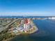 Aerial view of waterfront condo building with pool and parking at 6372 Palma Del Mar S Blvd # 505, St Petersburg, FL 33715