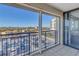 View from condo balcony overlooking parking lot and partial ocean view at 6372 Palma Del Mar S Blvd # 505, St Petersburg, FL 33715