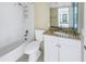 Clean bathroom with granite countertop and shower/tub combo at 6372 Palma Del Mar S Blvd # 505, St Petersburg, FL 33715