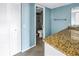 Bathroom with granite countertop and shower at 6372 Palma Del Mar S Blvd # 505, St Petersburg, FL 33715